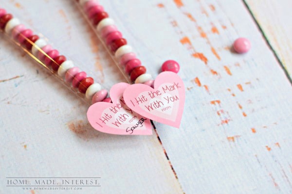 This Cupid’s Arrow Valentine’s Day Favor hits the mark! With a pink heart and Valentine’s Day M&Ms this is a great kid’s Valentine’s Day classroom favor and even adults won’t be able to resist a this simple Valentine’s Day craft.