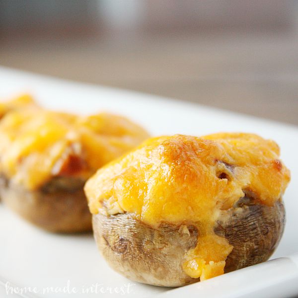Easy Cheesy Appetizers that make great parties food. Kids and adults love cheese! Quick and simple appetizers for any occasion. This simple mushroom appetizer is filled with cheese and chorizo.