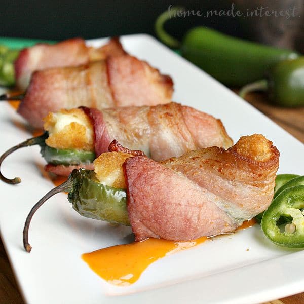This snack hack makes bacon wrapped jalapeño poppers even easier! This is a great recipe for game day or just a fun party appetizer.