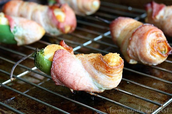 This snack hack makes bacon wrapped jalapeño poppers even easier! This is a great recipe for game day or just a fun party appetizer.