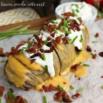Hasselback potatoes is a different way to serve potatoes at your next party or holiday dinner. These fully loaded potatoes are filled with cheese and covered in all the fixin’s, bacon, sour cream, butter, chives.