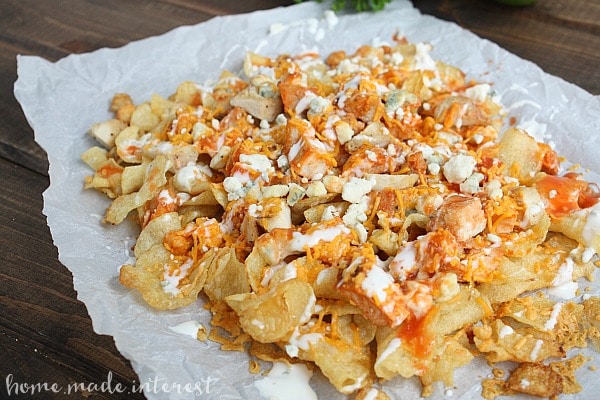 This easy buffalo chicken nacho recipe is perfect for game day and makes a simple party food that your guests are going love!
