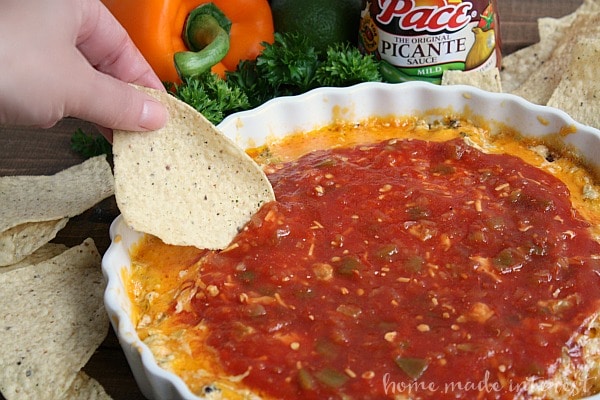 This Mexican sunset dip is a tasty mix of cheese, green chilies, Mexican chorizo, and salsa. It is such a simple recipe to make for parties.
