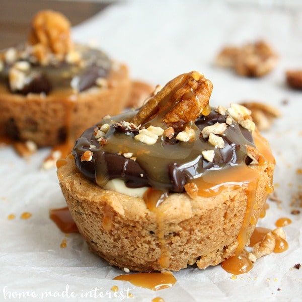 This No Bake Turtle Cheesecake is a creamy cheesecake covered in chocolate, caramel, and pecans, in a chocolate cookie cup. An easy dessert recipe that everyone will love.