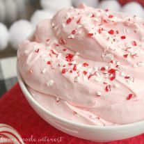 This easy no bake peppermint fluff dip is an easy dessert recipe that even the kids can make! Crush peppermints and creamy marshmallow fluff make this dip perfect for Christmas dessert! If you like marshmallow fluff and cream cheese together you are going to love this peppermint dessert.