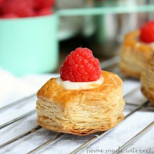 These sweet, bite size, White Chocolate Raspberry Puffs are a simple dessert recipe that is perfect for the holidays!
