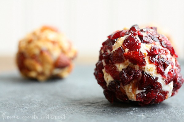 These mini cheese balls are an easy appetizer recipe that everyone will love. We have three simple cheese ball recipes with cranberries, almonds, and chives.