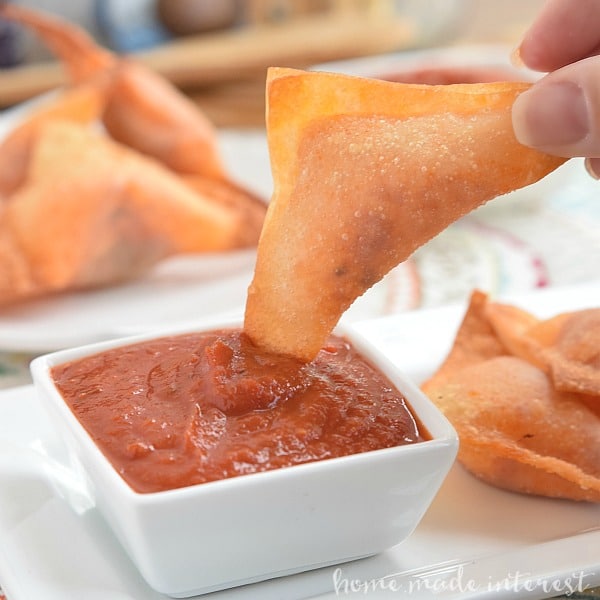 These Pizza Wontons are a fun pizza snack for kids of all ages. Everyone will love this crunchy wonton filled with pizza sauce, cheese, and pepperonis!