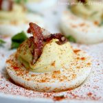 These spicy deviled eggs are a tasty twist on a classic with the zing of Sriracha, the velvety smoothness of avocado, and the saltiness of bacon. Sriracha Bacon and Avocado deviled eggs are low carb and gluten free and make a great party appetizer and Easter dinner and Easter brunch recipe!