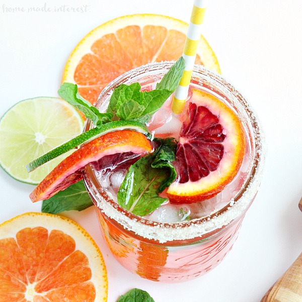 Blood oranges and a little mint make this Blood Orange Mojito beautiful and delicious. I’ll be enjoying this easy mojito recipe all summer long. I might even try something different and make this my Cinco de Mayo drink!