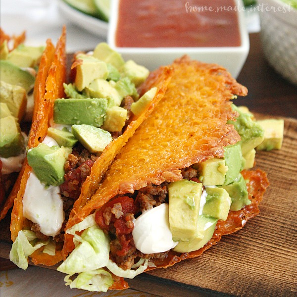 Have a low carb taco night with these cheese taco shells made from baked cheddar cheese formed into the shape of a taco! Stuff your low carb taco with ground chorizo and ground beef cooked in Rotel and topped with diced avocado and sour cream.