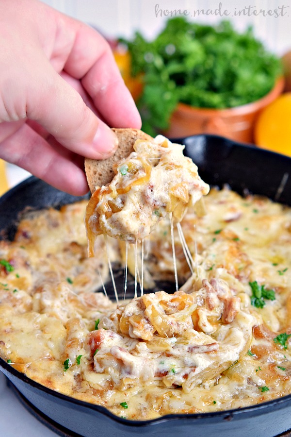 Wow your friends with this easy Caramelized Onion and Bacon Skillet Dip. This is a perfect dip recipe for parties or a great Father’s Day recipe. Sweet onions and salty bacon mixed with lots of melted cheese make this dip rich, smokey and ooey gooey delicious!