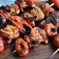 Fire up the grill for this awesome kabob recipe! This grilled BBQ bacon and shrimp skewers are layers of sweet peppers, shrimp and bacon, glazed with your favorite BBQ sauce and grilled over an open flame for a smokey flavor that is out of this world.