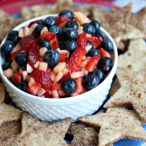 Blueberries, apples, and strawberries make up this light and fresh summer fruit salsa. It is perfect side dish or dessert recipe for Memorial Day, 4th of July, and Labor Day cookouts with it’s beautiful red, white, and blue colors and served with crisp, sweet, cinnamon chips shaped like stars.