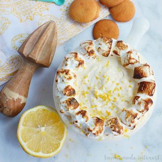 This fluffy Lemon Meringue Dip is a mix of meringue and lemon curd served with graham crackers or cookies. It is a no bake summer dessert that you can enjoy all year long! Take it to your next summer potluck or make it for your friends at your next party.