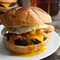 This grilled Bacon BBQ Meatloaf Burger is a tender and juicy burger twist on a classic comfort food, meatloaf! The burger patties are made with a delicious meatloaf base basted in BBQ sauce and topped with crispy bacon and a fried egg! An awesome grilled burger recipe that is perfect for summer, 4th of July, and Labor Day cookouts!