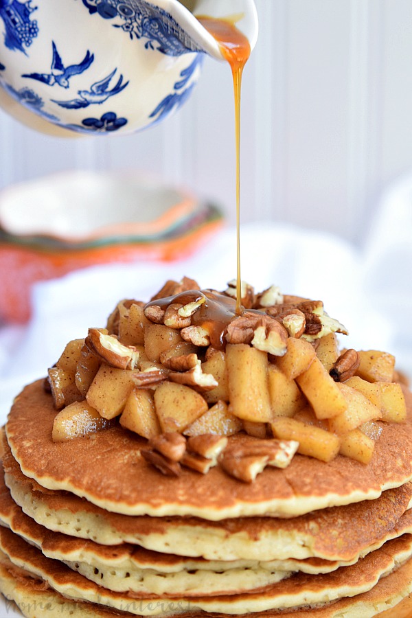 These delicious Caramel Apple Pecan Pancakes are light and fluffy pancakes topped with a creamy caramel sauce, baked apples, and crunchy pecans. It is an amazing fall breakfast recipe.