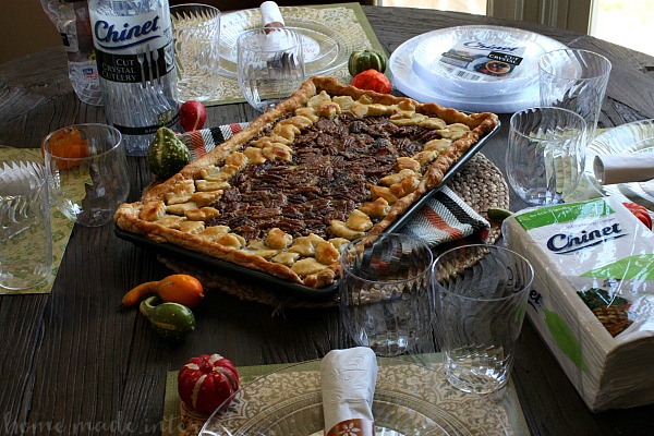 This beautiful pecan slab pie recipe takes a traditional pecan pie recipe and doubles it, making one big slab pie that the whole family will enjoy. Make this pecan slab pie for Thanksgiving dessert or Christmas dessert. This pecan slab pie is extra pretty with a crust made with pie dough cut into fall leaves. Impress your guests with this easy pecan pie recipe!