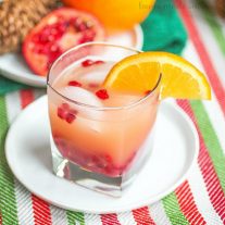Celebrate on New Year’s Eve with this pretty and delicious drink recipe! This Orange Pomegranate Crush is an easy drink recipe made with orange, pomegranate, vodka and triple sec. It is a great easy drink recipe for New Year’s Eve!