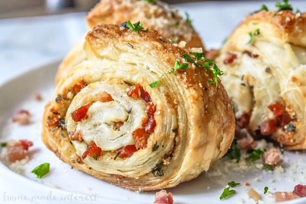 Parmesan puff pastry rolled into a pinwheel and baked 