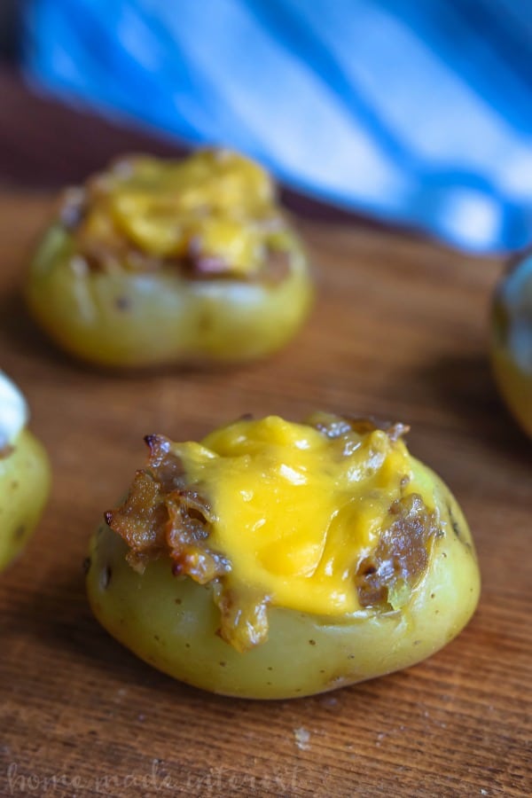 We made these Philly Cheesesteak Potato Bites two ways, original Philly cheesesteak and provolone Philly cheesesteak. These potato bites are an easy game day recipe that would be perfect for a Super Bowl party. They are like a potato skin recipe in miniature. Make this easy potato appetizer for your next party.