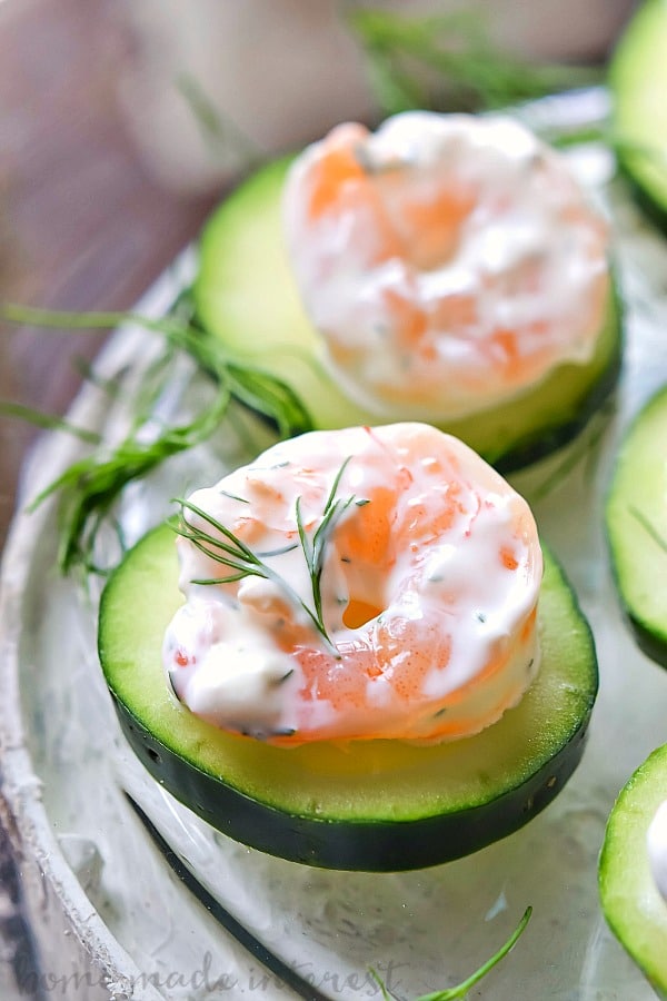 Shrimp and Dill Cucumber Appetizer | This beautiful shrimp and dill appetizer is an easy appetizer for parties and makes a great low carb brunch recipe. Steamed shrimp in a light dill sauce served on cucumber slices makes an easy shrimp appetizer that is a light and fresh Easter brunch recipe or Mother’s Day brunch recipe.