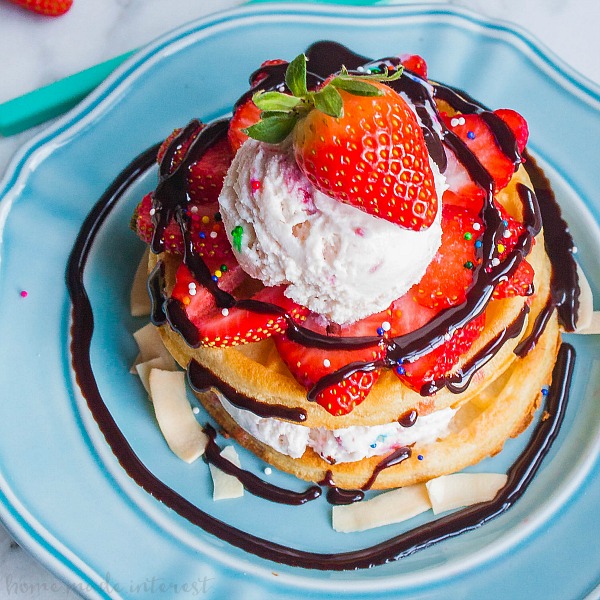 Waffle Sundae | Make this easy Waffle Sundae recipe for a fun family night or just because you want the best sundae ever! Tasty waffles piled high with ice cream and topped with another waffle before covering it with your favorite ice cream toppings. Kids and adults will love this easy dessert recipe! Who wouldn’t want ice cream and waffles?!