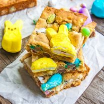Easter Candy Blondies | Looking for something to do with all of that leftover Easter candy? This easy blondie recipe uses Peeps along with all of your other favorite Easter candy to make Easter Candy Blondies. If you’re looking for a fun Peeps recipe you’re going to love this! This Easter dessert recipe is so good and so simple to make!