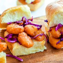 Bang Bang Shrimp Sliders | These easy Bang Bang Shrimp Sliders are sweet and spicy and full of flavor. They take a delicious copycat Bang Bang Shrimp recipe and put it on a slider bun with a cool and crisp red cabbage slaw. This is an amazing appetizer recipe that is an easy party appetizer or a quick and easy weeknight dinner idea.
