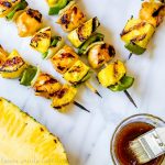Grilled Pineapple Teriyaki Chicken Skewers | These easy grilled Pineapple Teriyaki Chicken Skewers make an amazing summer dinner recipe. Grilled pineapple, peppers, onions, and chicken are glazed with a sweet and salty homemade teriyaki sauce for a summer grill recipe the whole family will love.