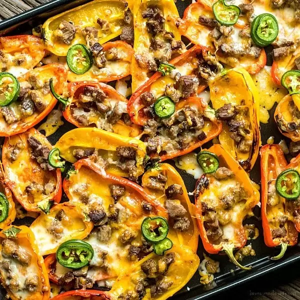low carb nachos filled with carne asada, cheese, and jalapenos,. 