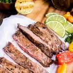 sliced grilled skirt steak, sweets peppers and limes