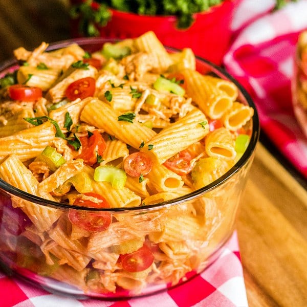 glass bowl filled with buffalo chicken pasta salad