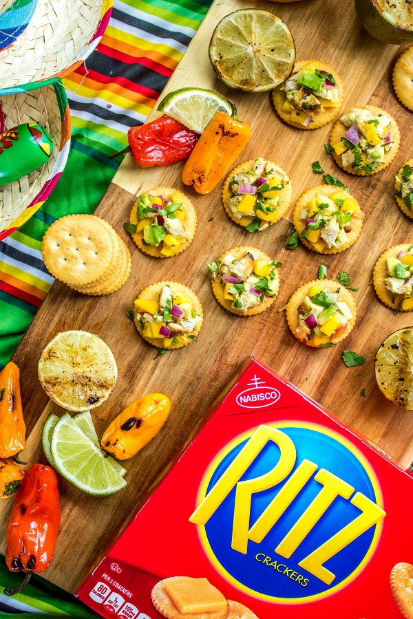 RITZ crackers topped with Mango Chicken Salsa on a Cinco de Mayo party table