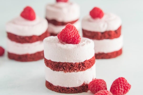 Four mini raspberry mousse red velvet cakes
