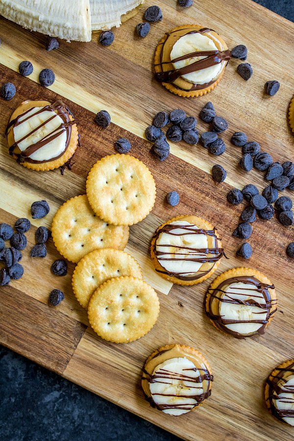 Ritz crackers topped with banana and chocolate