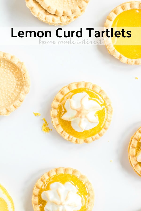 These easy Lemon Curd Tartlets are flaky, mini pastry tart shells filled with homemade lemon curd and topped with meringue that is lightly toasted. These lemon tarts are a delicious bite-sized dessert that is one of my favorite dessert recipes! These easy mini pies are a sweet treat everyone will love! #tart #baking #lemoncurd #lemon #meringue #dessert #dessertrecipes #homemadeinterest