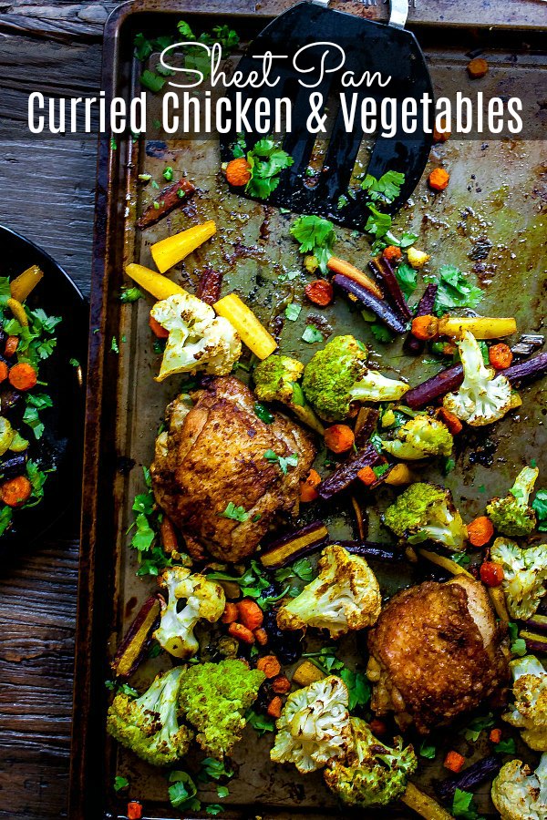 This Sheet Pan Curried Chicken and Vegetables is an easy, healthy, dinner recipe made with chicken thighs and veggies tossed curry powder and oven baked. Whole 30 and Paleo this easy weeknight dinner recipe is a favorite in my house. #curry #chicken #sheetpan #easydinnerrecipes #cauliflower #homemadeinterest