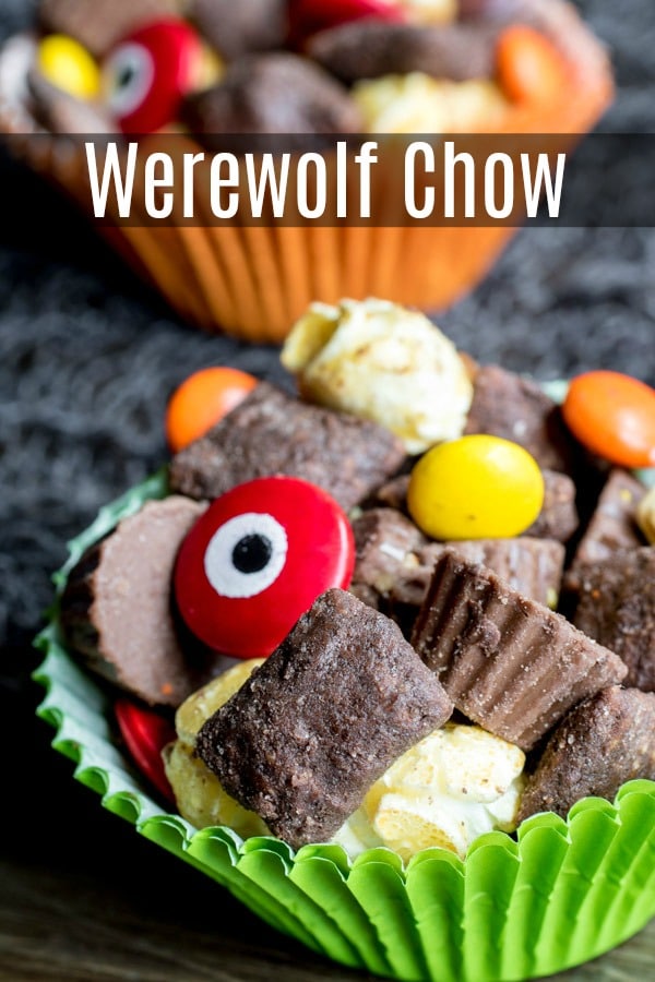 Werewolf Chow is homemade Halloween puppy chow, or muddy buddies, made with crispy, peanut butter and chocolate coated rice cereal, caramel corn, and Halloween candy! We've taken the original Chex Mix recipe and turned it into Halloween peanut butter chocolate goodness. The perfect Halloween party food ! #halloweenparty #halloween #peanutbutter #chocolate #muddybuddies #puppychow #dessert #homemadeinterest