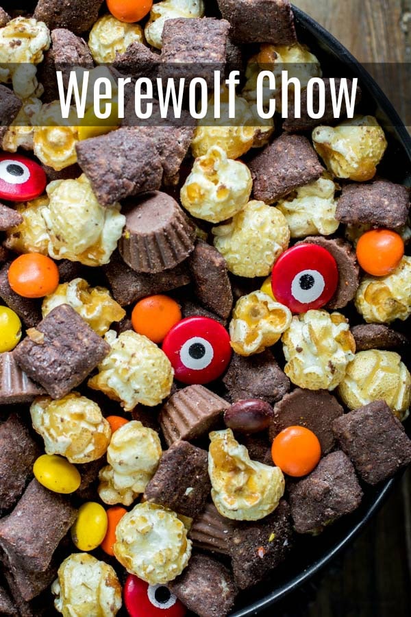 Werewolf Chow is homemade Halloween puppy chow, or muddy buddies, made with crispy, peanut butter and chocolate coated rice cereal, caramel corn, and Halloween candy! We've taken the original Chex Mix recipe and turned it into Halloween peanut butter chocolate goodness. The perfect Halloween party food ! #halloweenparty #halloween #peanutbutter #chocolate #muddybuddies #puppychow #dessert #homemadeinterest