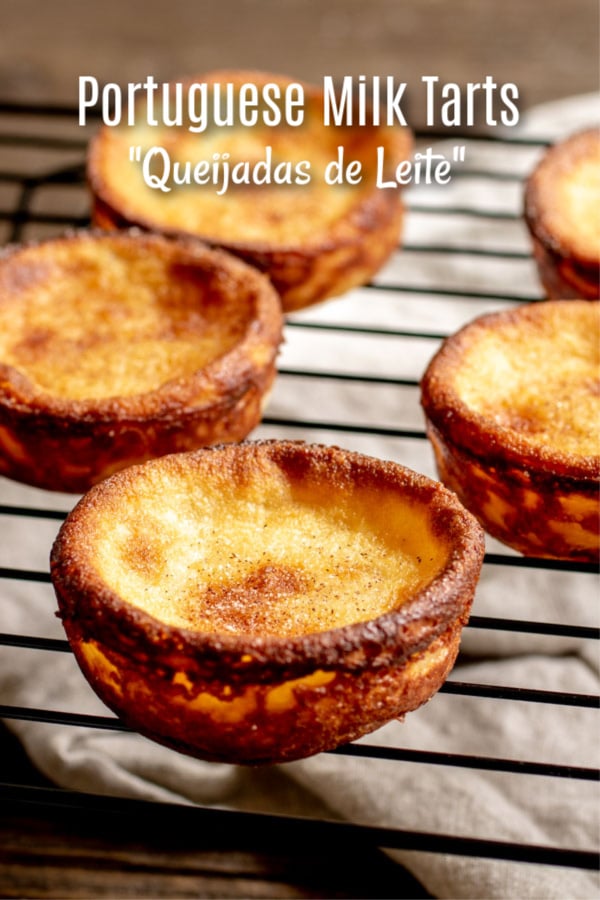 Portuguese Milk Tarts, Queijadas de Leite, are a traditional Portuguese dessert recipe made with simple ingredients. Milk, sugar, butter, eggs, and a little flour bake up into sweet, creamy pastries that you can find in many Portuguese bakeries. #portuguese #baking #tart #milk #dessert #sweettreats #cupcake #homemadeinterest