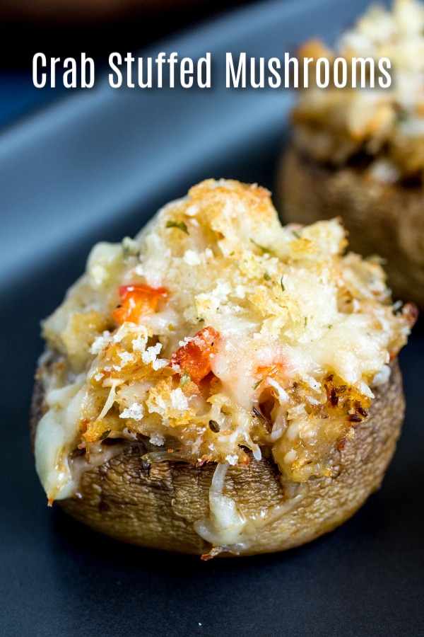 These delicious Crab Stuffed Mushrooms are a combination of crab meat, breadcrumbs, and cheese. It is an easy appetizer recipe that makes a great Christmas appetizer of New Year's Eve appetizer. It is a classic bite size seafood appetizer that is sure to impress your guests. #appetizer #christmas #newyearseve #mushroom #crab #homemadeinterest