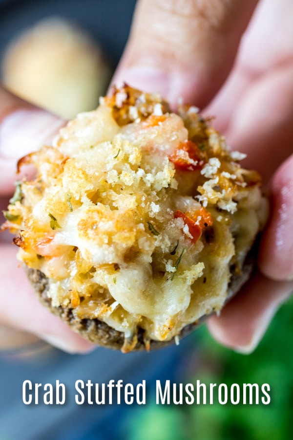 These delicious Crab Stuffed Mushrooms are a combination of crab meat, breadcrumbs, and cheese. It is an easy appetizer recipe that makes a great Christmas appetizer of New Year's Eve appetizer. It is a classic bite size seafood appetizer that is sure to impress your guests. #appetizer #christmas #newyearseve #mushroom #crab #homemadeinterest