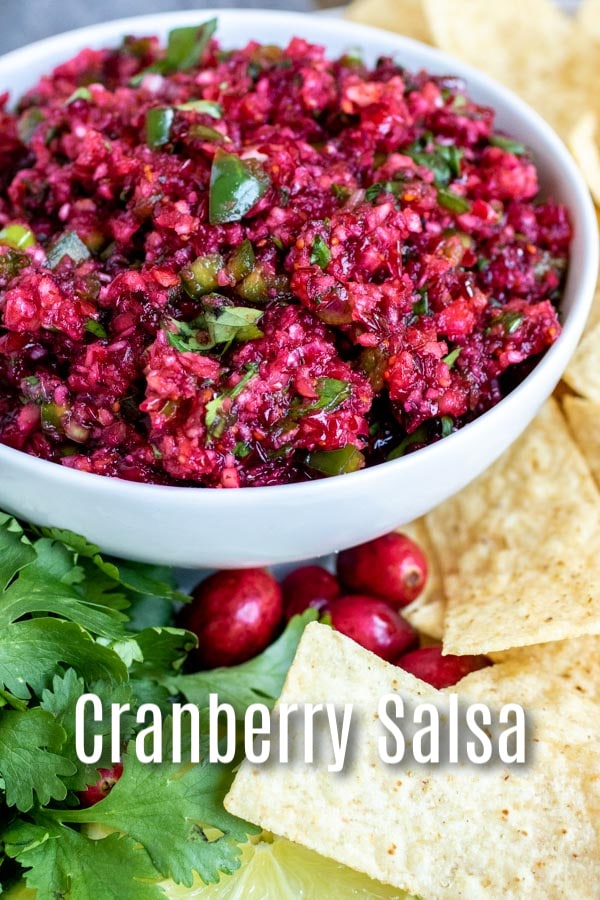 This Fresh Cranberry Salsa is an easy appetizer recipe that you can serve over cream cheese, or as a dip with tortilla chips. It is a little sweet and a little spicy made with fresh cranberries and jalapeno, and with orange juice. It is the perfect holiday appetizer for all of your Thanksgiving, Christmas and New Year's parties. AD #cranberries #salsa #appetizer #thanksgiving #christmas #newyears #dip #homemadeinterest