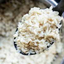 This recipe for Instant Pot Brown Rice makes perfect brown rice every time. Make this easy brown rice recipe in your pressure cooker using chicken broth, vegetable broth, or water. This easy Instant Pot side dish is family dinners. #instantpot #pressurecookerrecipes #instantpothack #brownrice #homemadeinterest