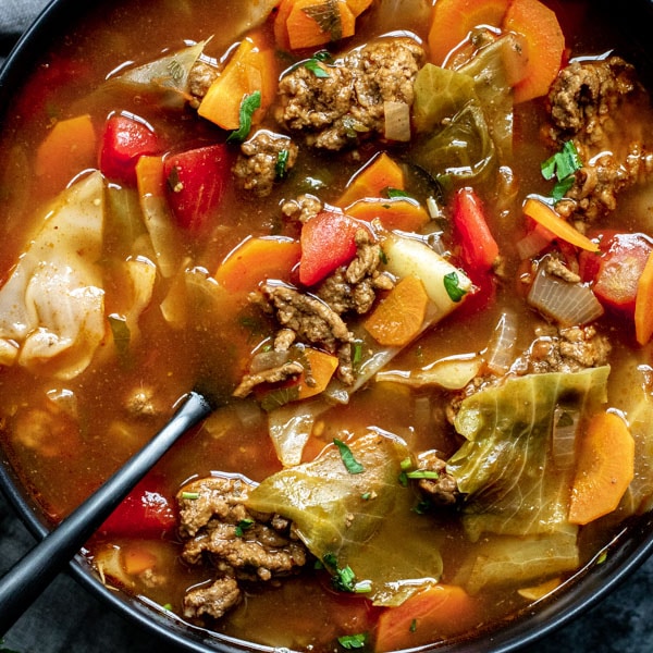 Instant Pot Cabbage Roll Soup in a bowl with spoon