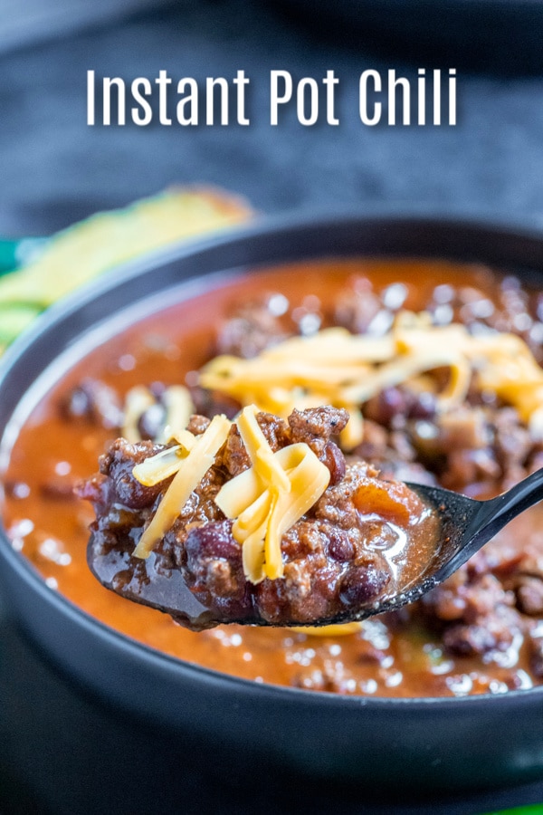 This easy Instant Pot Chili is ground beef, kidney beans, a mix of spices, jalapenos, and chipotle peppers. It is the BEST Instant Pot Chili you'll ever make. This spicy chili recipe is guaranteed to warm you up on cold days. #jalapenos #chili #instantpot #pressurecookerrecipes #instantpotrecipes #groundbeef #homemadeinterest