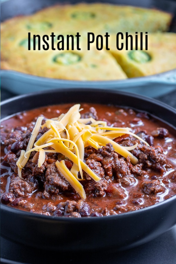 This easy Instant Pot Chili is ground beef, kidney beans, a mix of spices, jalapenos, and chipotle peppers. It is the BEST Instant Pot Chili you'll ever make. This spicy chili recipe is guaranteed to warm you up on cold days. #jalapenos #chili #instantpot #pressurecookerrecipes #instantpotrecipes #groundbeef #homemadeinterest