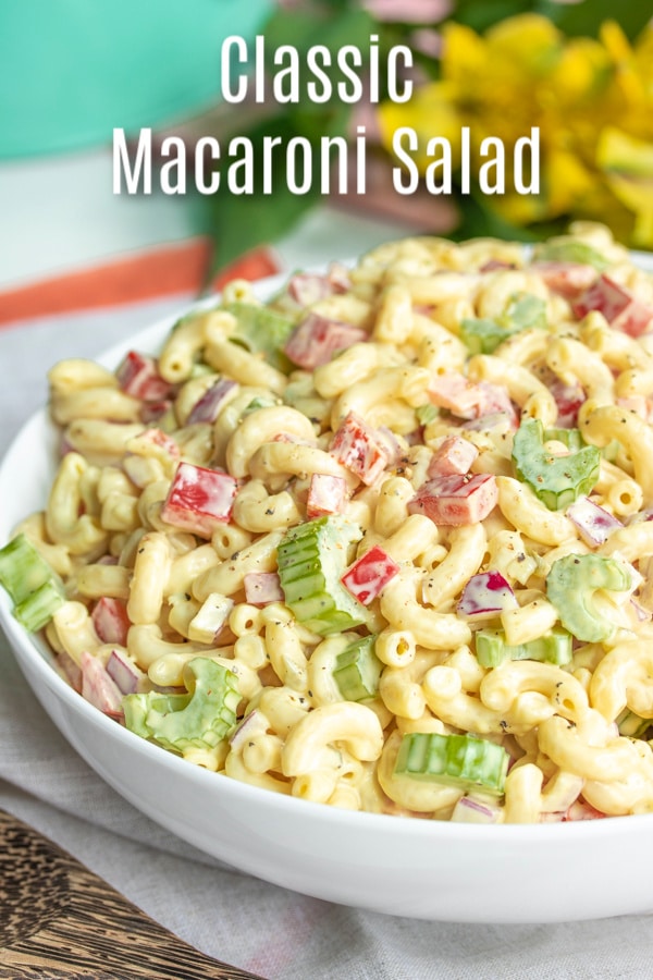 Classic Macaroni Salad is an easy side dish for potlucks, summer parties, or Easter dinner! Elbow macaroni, veggies, and a creamy tangy sauce make this cold pasta salad perfect for a crowd. It's an old fashioned southern macaroni salad recipe made with mayonnaise, vinegar, sweet pickle relish, and mustard. Add ham, tuna, or hard-boiled eggs if you like! #macaroni #pasta #easter #potlucks #summerrecipes #pastasalad #homemadeinterest