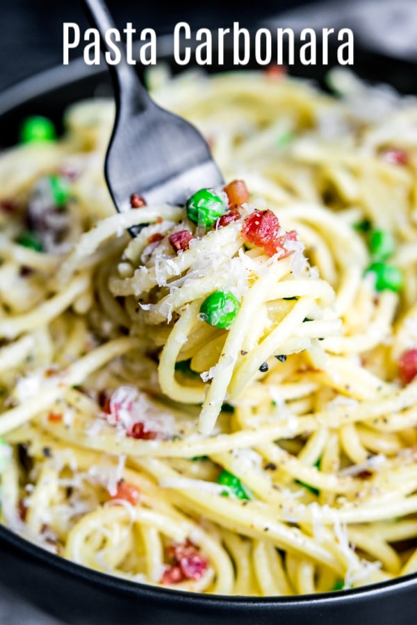 This authentic pasta carbonara recipe is an easy spaghetti carbonara made with a creamy sauce of eggs, and pecorino romano cheese, tossed with pancetta and peas. This creamy pasta carbonara can also be made with bacon and without peas. It's the best spaghetti carbonara recipe and so easy to make! #pasta #bacon #spaghetti #easydinnerrecipes #homemadeinterest